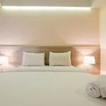 Fully Furnished Studio No Kitchen Apartment At Mustika Golf Residence By Travelio